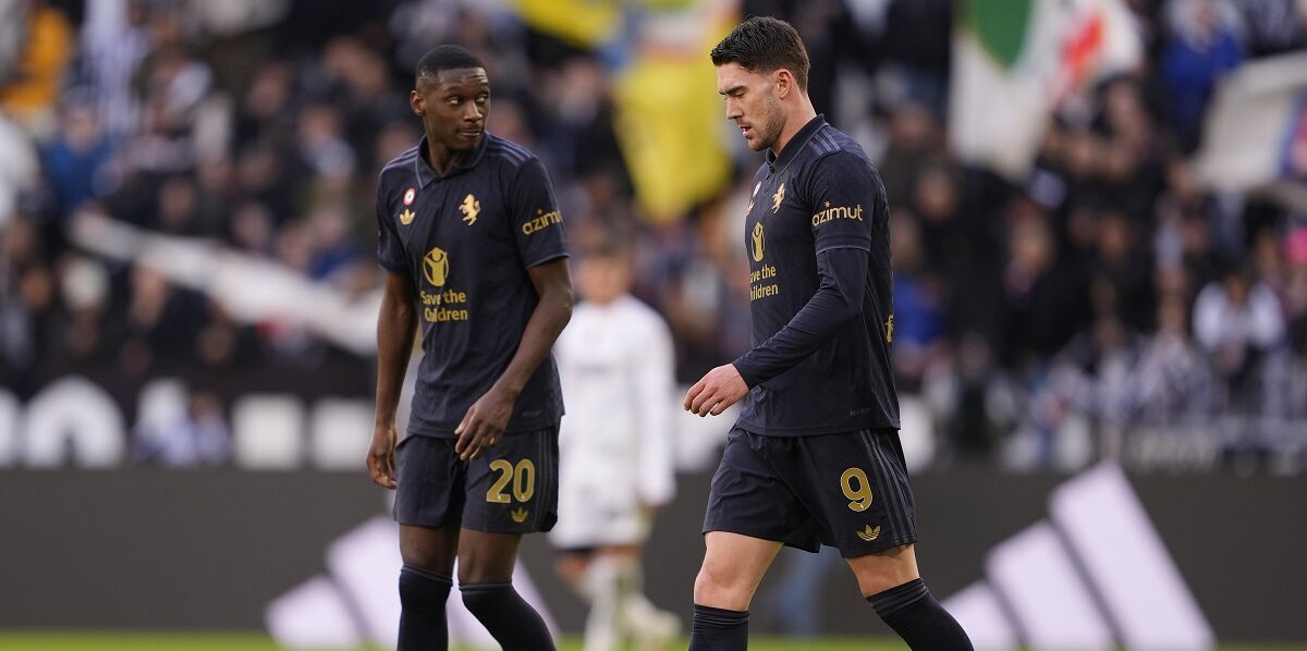 Juventus' Kolo Muani Randal, left, and Dusan Vlahovic walk on the field scored during the Serie A soccer match between Juventus and Empoli at the Juventus Stadium in Turin, Italy, Sunday, Feb. 2, 2024. (Fabio Ferrari/LaPresse via AP)