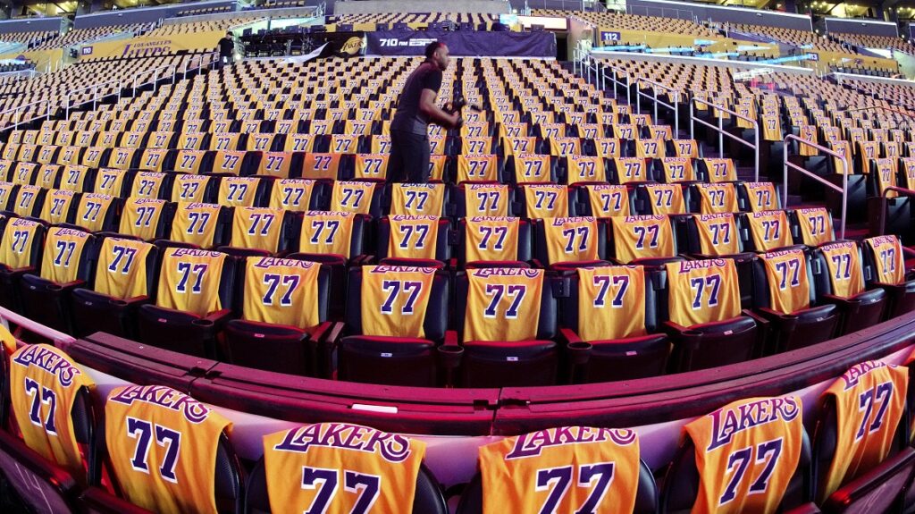 T-shirts with Los Angeles Lakers guard Luka Doncic's number are seen played out on fan seats prior to an NBA basketball game between the Lakers and the Utah Jazz Monday, Feb. 10, 2025, in Los Angeles. (AP Photo/Mark J. Terrill)