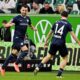 Bochum's Erhan Masovic, left, celebrates scoring during the Bundesliga soccer match between VfL Wolfsburg and VfL Bochum at Volkswagen Arena, Wolfsburg, Germany, Saturday Feb. 22, 2025. (Swen Pförtner/dpa via AP)