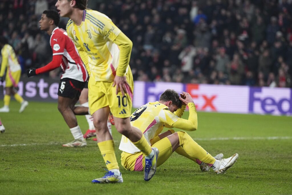 Juventus' Dusan Vlahovic reacts after missing a scoring chance during the Champions League playoff second leg soccer match between PSV and Juventus at Phillips Stadium in Eindhoven, Netherlands, Wednesday, Feb.19, 2025. (AP Photo/Peter Dejong)