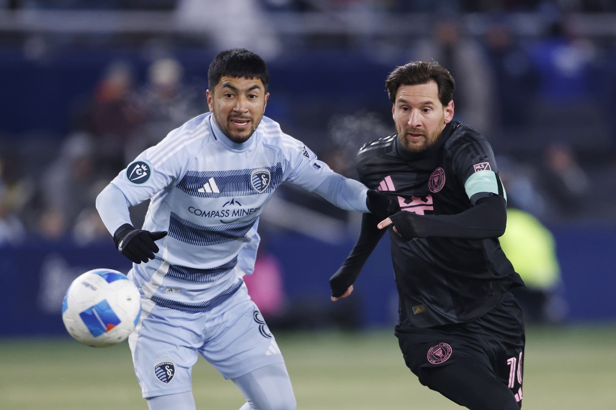 Sporting Kansas City midfielder Memo Rodríguez, left, and Inter Miami forward Lionel Messi compete for the ball during the first half of a CONCACAF Champions Cup soccer match, Wednesday, Feb. 19, 2025, in Kansas City, Kan. (AP Photo/Colin E. Braley)