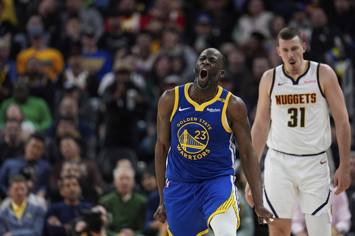 Golden State Warriors forward Draymond Green (23) reacts during the second half of an NBA basketball game against the Denver Nuggets, Monday, March 17, 2025, in San Francisco. (AP Photo/Godofredo A. Vásquez)