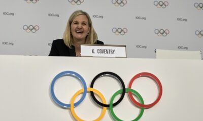 Kirsty Coventry laughs during a press conference after she was elected as the new IOC President at the International Olympic Committee 144th session in Costa Navarino, western Greece, Thursday, March 20, 2025. (AP Photo/Thanassis Stavrakis)