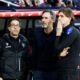 Osasuna's head coach Vicente Moreno, centre, looks on ahead of the Spanish La Liga soccer match between Barcelona and Osasuna at the Lluis Companys Olympic Stadium, in Barcelona, Spain, Saturday, March 8, 2025. (AP Photo/Joan Monfort)