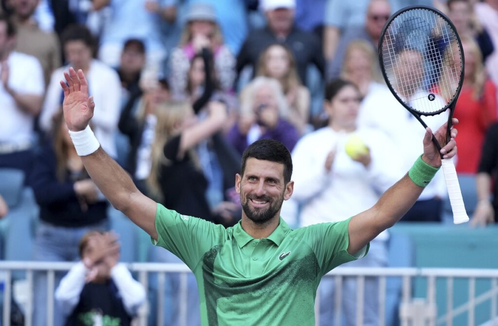 Novak Djokovic, of Serbia, waves to the crowd after defeating Rinky Hijikata, of Australia, during the Miami Open tennis tournament, Friday, March 21, 2025, in Miami Gardens, Fla. (AP Photo/Lynne Sladky)