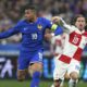 Croatia's Luka Modric, right, and France's Kylian Mbappe compete for the ball during the UEFA Nations League quarterfinal second leg soccer match between France and Croatia, at the Stade de France in Saint-Denis, outside Paris, Sunday, March 23, 2025. (AP Photo/Thibault Camus)