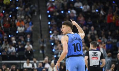 Los Angeles Clippers guard Bogdan Bogdanovic celebrates after a 3-point basket during the first half of an NBA basketball game against the Charlotte Hornets, Sunday, March 16, 2025, in Inglewood, Calif. (AP Photo/William Liang)