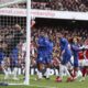 Chelsea's goalkeeper Robert Sanchez fails to save the goal from Arsenal's Mikel Merino during the English Premier League soccer match between Arsenal and Chelsea at Emirates stadium in London, Sunday, March 16, 2025. (AP Photo/Ian Walton)