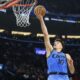 Los Angeles Clippers guard Bogdan Bogdanovic shoots during the first half of an NBA basketball game against the Charlotte Hornets, Sunday, March 16, 2025, in Inglewood, Calif. (AP Photo/William Liang)