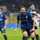 Inter Milan's Hakan Calhanoglu, centre, celebrates after scoring his side's second goal during the Serie A soccer match between Inter Milan and Monza at the San Siro stadium in Milan, Italy, Saturday, March 8, 2025. (AP Photo/Luca Bruno)