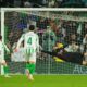 Real Madrid's goalkeeper Thibaut Courtois, right, fails to save the ball as Betis' Isco, left, scores his side's second goal during a Spanish La Liga soccer match between Real Betis and Real Madrid at the Benito Villamarin stadium in Seville, Spain, Saturday, March 1, 2025. (AP Photo/Jose Breton)