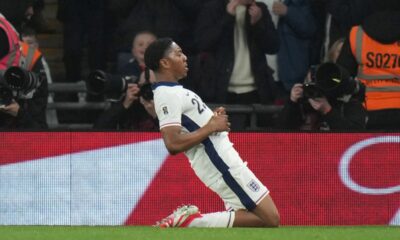 England's Myles Lewis-Kelly celebrates after scoring his side's opening goal during a World Cup qualifying soccer match between England and Albania at Wembley stadium in London, Friday, March 21, 2025. (AP Photo/Alastair Grant)