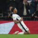 England's Myles Lewis-Kelly celebrates after scoring his side's opening goal during a World Cup qualifying soccer match between England and Albania at Wembley stadium in London, Friday, March 21, 2025. (AP Photo/Alastair Grant)