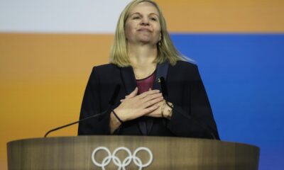 Kirsty Coventry reacts after she was announced as the new IOC President at the International Olympic Committee 144th session in Costa Navarino, western Greece, Thursday, March 20, 2025. (AP Photo/Thanassis Stavrakis)