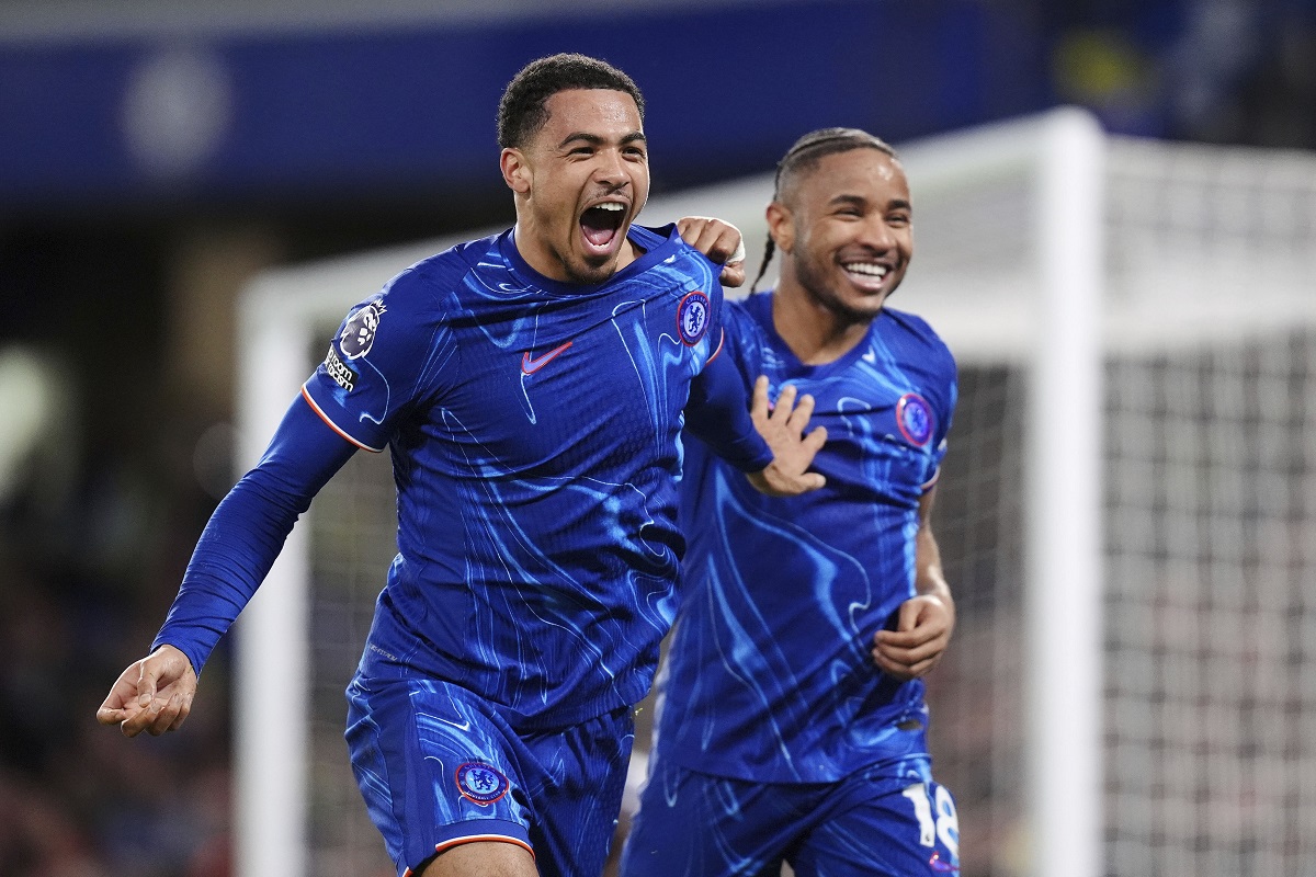 Chelsea's Levi Colwill, left, celebrates scoring their side's third goal of the game with teammate Christopher Nkunku during the English Premier League soccer match between Chelsea and Southampton at Stamford Bridge, London, Tuesday, Feb. 25, 2025. (John Walton/PA via AP)