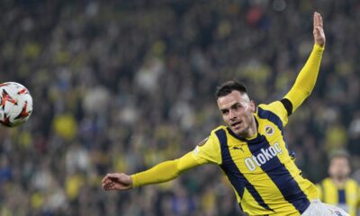 Fenerbahce's Filip Kostic goes for the ball during the Europa League round of 16 first leg soccer match between Fenerbahce and Rangers at Sukru Saracoglu stadium in Istanbul, Turkey, Thursday, March 6, 2025. (AP Photo/Khalil Hamra)