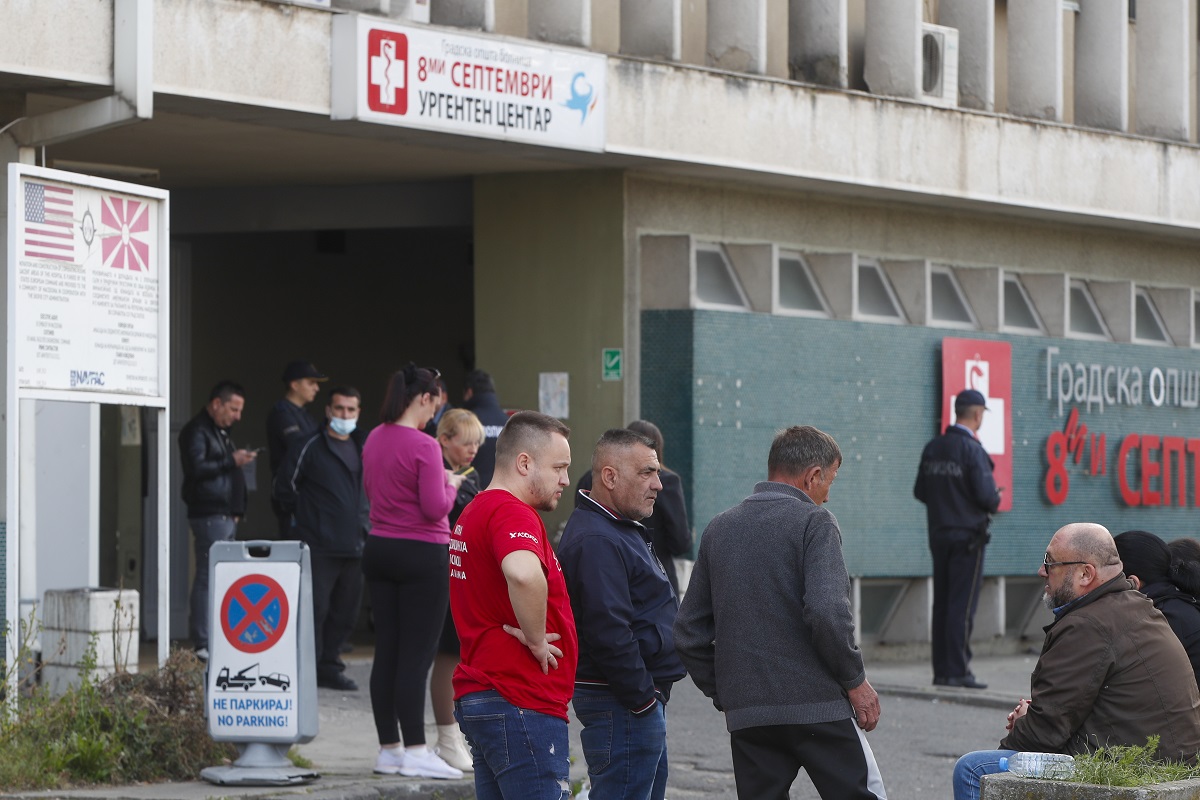 CORRECTS CITY TO SKOPJE - People wait in front of the hospital in Skopje, North Macedonia, Sunday, March 16, 2025, after a massive fire in a nightclub in the town of Kocani. (AP Photo/Boris Grdanoski)