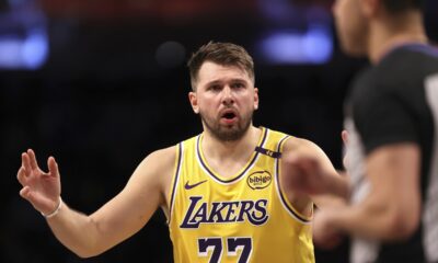 Los Angeles Lakers' Luka Doncic reacts after a foul was called on him during the first half of an NBA basketball game against the Brooklyn Nets, Monday, March 10, 2025, in New York. (AP Photo/Pamela Smith)