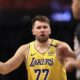 Los Angeles Lakers' Luka Doncic reacts after a foul was called on him during the first half of an NBA basketball game against the Brooklyn Nets, Monday, March 10, 2025, in New York. (AP Photo/Pamela Smith)