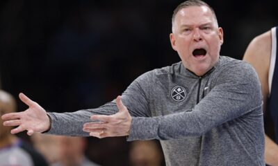 Denver Nuggets coach Michael Malone questions an official after a call during the first half of an NBA basketball game against the Oklahoma City Thunder, Monday, March 10, 2025, in Oklahoma City. (AP Photo/Nate Billings)