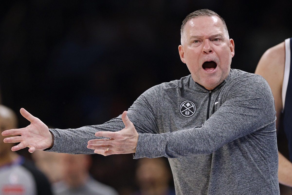 Denver Nuggets coach Michael Malone questions an official after a call during the first half of an NBA basketball game against the Oklahoma City Thunder, Monday, March 10, 2025, in Oklahoma City. (AP Photo/Nate Billings)