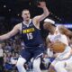 Oklahoma City Thunder guard Shai Gilgeous-Alexander, right, drives against Denver Nuggets center Nikola Jokic (15) during the first half of an NBA basketball game Monday, March 10, 2025, in Oklahoma City. (AP Photo/Nate Billings)