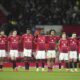 Manchester United players react after losing a penalty shootout during the English FA Cup soccer match against Fulham at the Old Trafford stadium in Manchester, England, Sunday, March 2, 2025. (AP Photo/Jon Super)