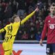 Dortmund's Maximilian Beier celebrates after scoring during the Champions League round of 16 second leg soccer match between Lille and Borussia Dortmund in Villeneuve-d'Ascq , Wednesday, March 12, 2025. (AP Photo/Michel Euler)