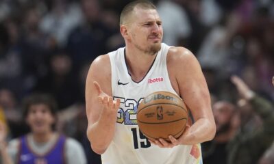 Denver Nuggets center Nikola Jokic reacts after being called for a foul in the second half of an NBA basketball game against the Phoenix Suns Friday, March 7, 2025, in Denver. (AP Photo/David Zalubowski)