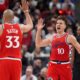 Los Angeles Clippers guard Bogdan Bogdanovic, right, celebrates with forward Nicolas Batum after scoring during the second half of an NBA basketball game against the Cleveland Cavaliers Tuesday, March 18, 2025, in Inglewood, Calif. (AP Photo/Mark J. Terrill)