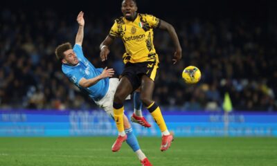 Napoli's Billy Gilmour left, and Inter Milan's Marcus Thuram battle for the ball during the Serie A soccer match between Napoli and Inter Milan, at the Naples Diego Armando Maradona stadium, Italy, Saturday March 1, 2025. (Alessandro Garofalo/LaPresse via AP)