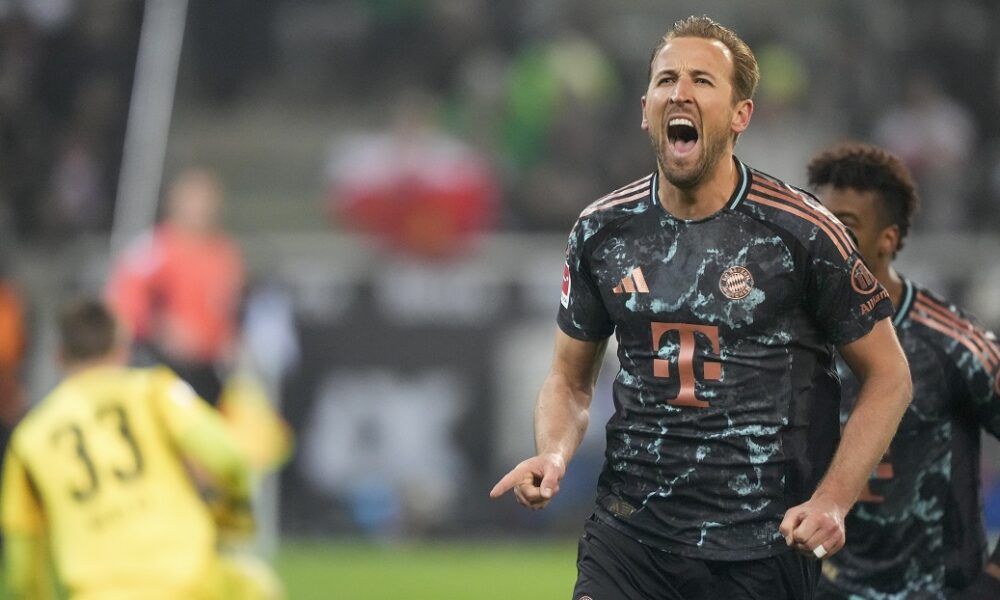 FILE - Bayern's Harry Kane celebrates after scoring the opening goal during the German Bundesliga soccer match between Borussia Moenchengladbach and Bayern Munich in Moenchengladbach, Germany, Saturday, Jan. 11, 2025. (AP Photo/Martin Meissner, file)
