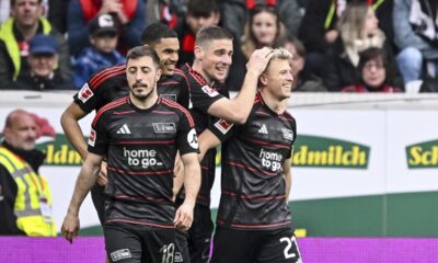From left: Berlin's Andrej Ilic, Danilho Doekhi, Andrej Ilic and Tim Skarke celebrate after scoring their side's second goal during the German Bundesliga soccer match between SC Freiburg - 1. FC Union Berlin at The Europa-Park Stadion in Freiburg, Germany, Sunday, March 30, 2025. (Harry Langer/dpa via AP)