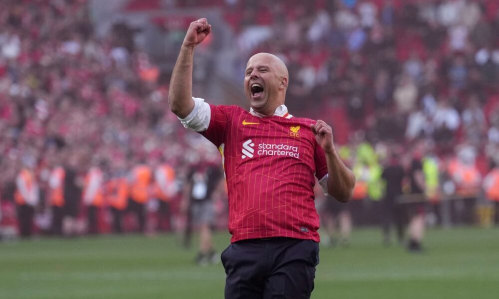 Liverpool's manager Arne Slot celebrates after winning the English Premier League soccer match between Liverpool and Tottenham Hotspur and clinching the Premier League title at Anfield in Liverpool, England, Sunday, April 27, 2025. (AP Photo/Jon Super)