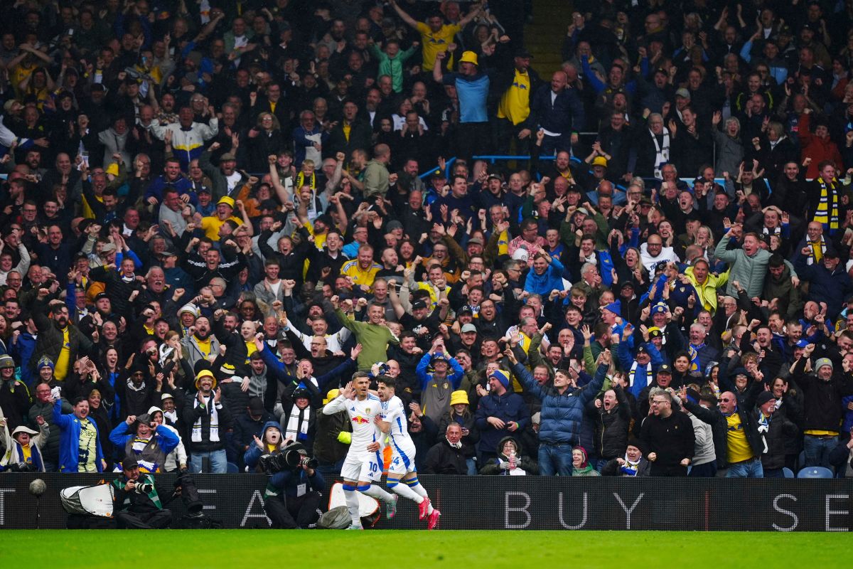 Leeds United's Wilfried Gnonto, second left, celebrates scoring their side's sixth goal of the game during the Championship soccer match between Leeds United and Stoke City at Elland Road, Leeds, England, Monday April 21, 2025. (Mike Egerton/PA via AP)