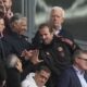 Bayern's Harry Kane, center, arrives on the tribune ahead of the German Bundesliga soccer match between RB Leipzig and FC Bayern Munich at the Red Bull Arena in Leipzig, Germany, Saturday, May 3, 2025. (AP Photo/Matthias Schrader)