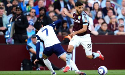 Tottenham Hotspur's Son Heung-Min, left, and Aston Villa's Marco Asensio battle for the ball during the English Premier League soccer match between Aston Villa and Tottenham Hotspur at Villa Park, Birmingham, England, Friday, May 16, 2025. (Nick Potts/PA via AP)
