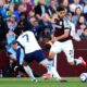 Tottenham Hotspur's Son Heung-Min, left, and Aston Villa's Marco Asensio battle for the ball during the English Premier League soccer match between Aston Villa and Tottenham Hotspur at Villa Park, Birmingham, England, Friday, May 16, 2025. (Nick Potts/PA via AP)