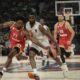 Olympiacos' Shaquielle McKissic tries to steal the ball from Monaco's Alpha Diallo duirng the Euroleague seimifinal basketball match between Olympiacos and Monaco in Abu Dhabi, United Arab Emirates, Sunday, May 18, 2025. (AP Photo/Fatima Shbair)