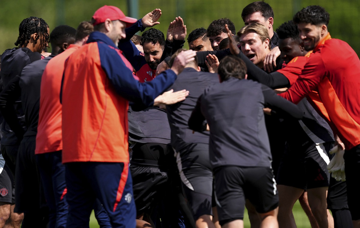 Manchester United manager Ruben Amorim with players during a training session at the Carrington Training Centre, Manchester, England, Wednesday May 7, 2025, one day ahead of their UEFA Europa League semifinal second leg soccer match against Athletic Club de Bilbao. (Martin Rickett/PA via AP)