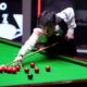 China's Zhao Xintong competes against Wales' Mark Williams during the final match of the World Snooker Championship, at the Crucible Theatre, Sheffield, England, Sunday May 4, 2025. (Mike Egerton/PA via AP)