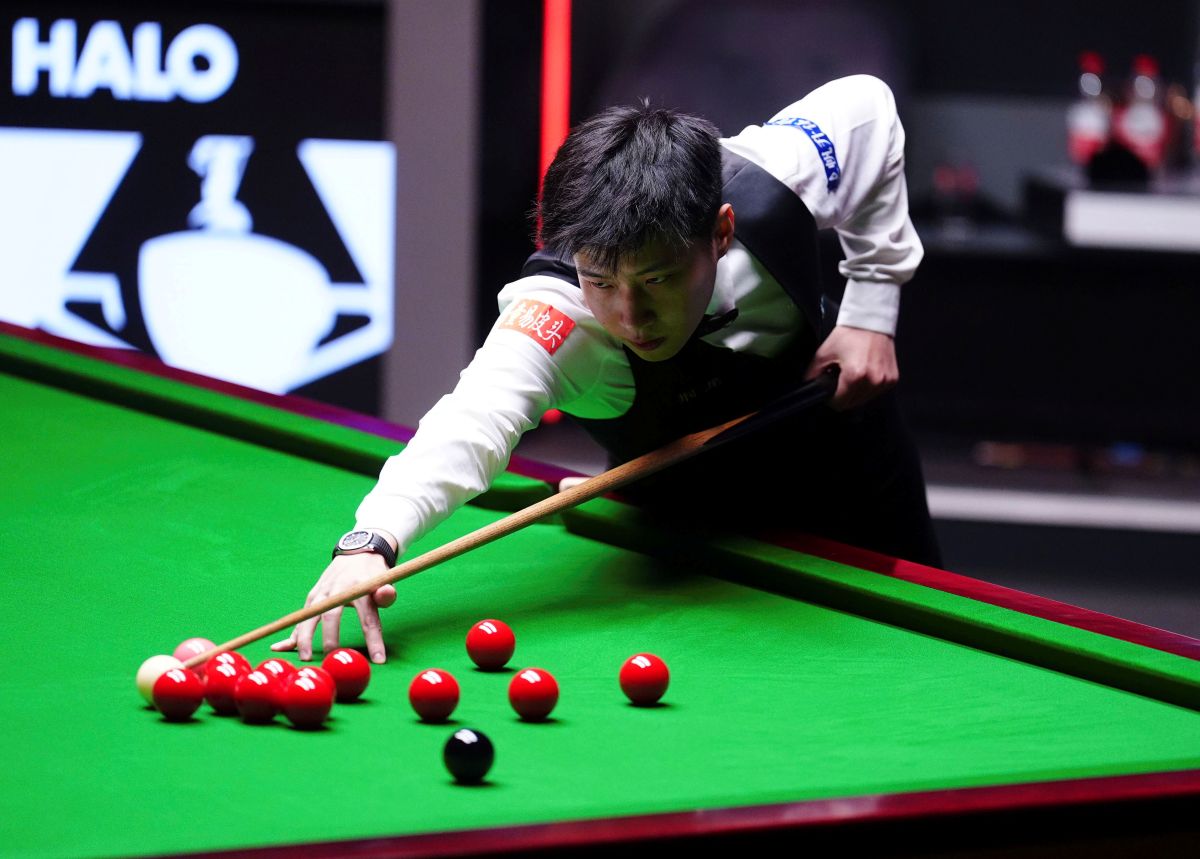 China's Zhao Xintong competes against Wales' Mark Williams during the final match of the World Snooker Championship, at the Crucible Theatre, Sheffield, England, Sunday May 4, 2025. (Mike Egerton/PA via AP)
