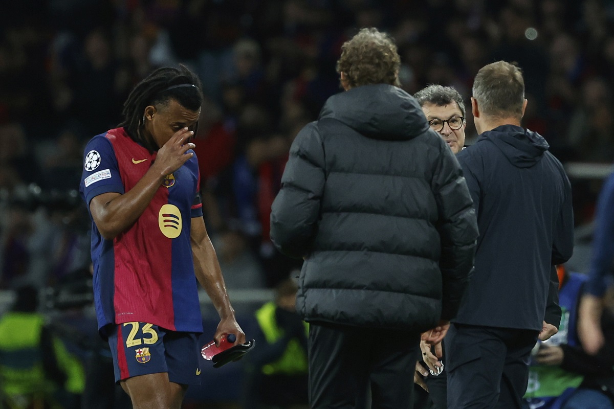 Barcelona's Jules Kounde walks off the pitch as he is being substituted due to injury during the Champions League semifinal first leg soccer match between Barcelona and Inter Milan at the Lluis Companys Olympic Stadium in Barcelona, Spain, Wednesday, April 30, 2025. (AP Photo/Joan Monfort)