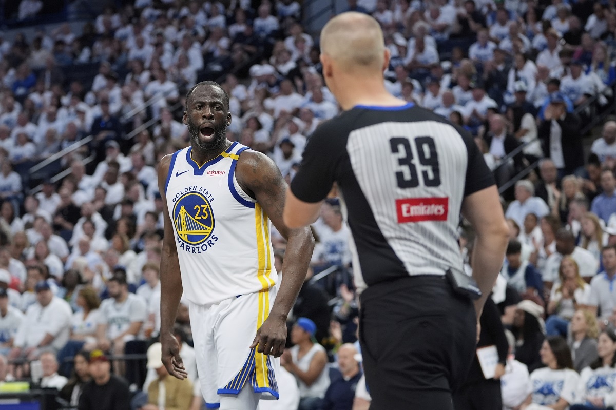 Golden State Warriors forward Draymond Green (23) reacts toward referee Tyler Ford during the second half of Game 2 of an NBA basketball second-round playoff series against the Minnesota Timberwolves, Thursday, May 8, 2025, in Minneapolis. (AP Photo/Abbie Parr)