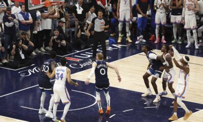 Oklahoma City Thunder guard Shai Gilgeous-Alexander, right, makes a free throw during the second half of Game 4 of the Western Conference finals of the NBA basketball playoffs against the Minnesota Timberwolves Monday, May 26, 2025, in Minneapolis. (AP Photo/Matt Krohn)
