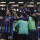 Atalanta's Lazar Samardzic, left, and his teammates celebrate their side's second goal during the Serie A soccer match between Atalanta Bergamo and AS Roma in Bergamo, Italy, Monday, May 12, 2025. (Stefano Nicoli/LaPresse via AP)