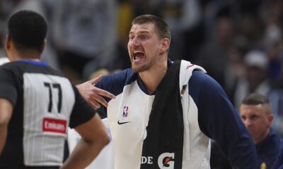 Denver Nuggets center Nikola Jokic yells to teammates from the bench in the second half of Game 5 of an NBA basketball playoff series against the Los Angeles Clippers, Tuesday, April 29, 2025, in Denver. (AP Photo/David Zalubowski)
