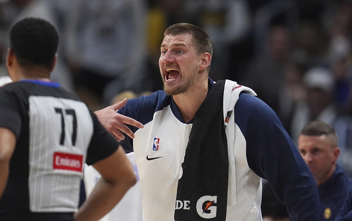 Denver Nuggets center Nikola Jokic yells to teammates from the bench in the second half of Game 5 of an NBA basketball playoff series against the Los Angeles Clippers, Tuesday, April 29, 2025, in Denver. (AP Photo/David Zalubowski)