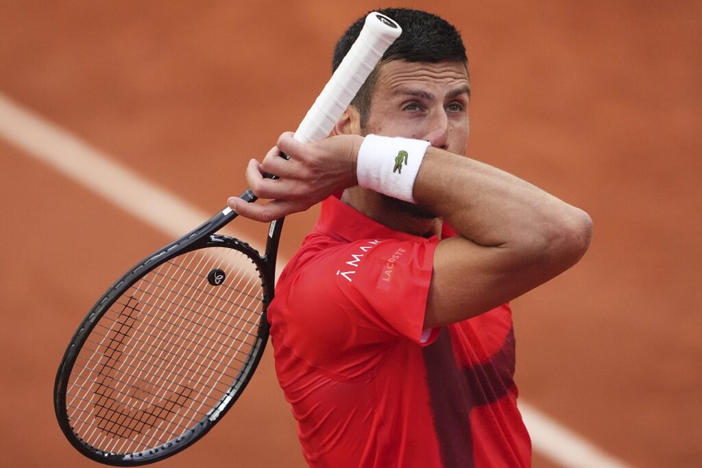 Serbia's Novak Djokovic reacts as he plays France's Corentin Moutet during their second round match of the French Tennis Open, at the Roland-Garros stadium, in Paris, Thursday, May 29, 2025. (AP Photo/Lindsey Wasson)