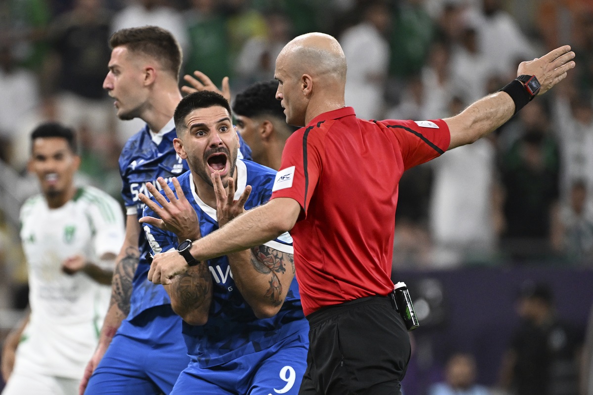 Al Hilal's Aleksandar Mitrovic reacts to the referee during a AFC Champions League Elite semifinal soccer match against Al Hilal at Alinma Stadium in Jeddah, Saudi Arabia, Tuesday, April, 29, 2025. (AP Photo/Ali Issa)